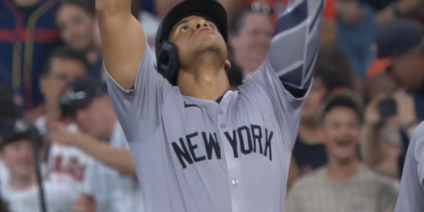 Juan Soto points to the sky after a game-winning hit
