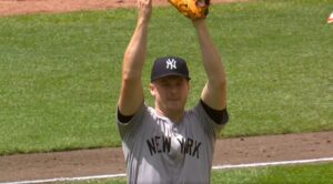 Clarke Schmidt celebrates a catch