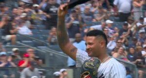 Luis Gil tips his cap to the fans