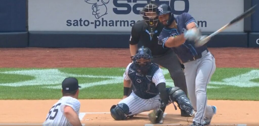 Carlos Rodon strikes out one of the 10 Rays he retired