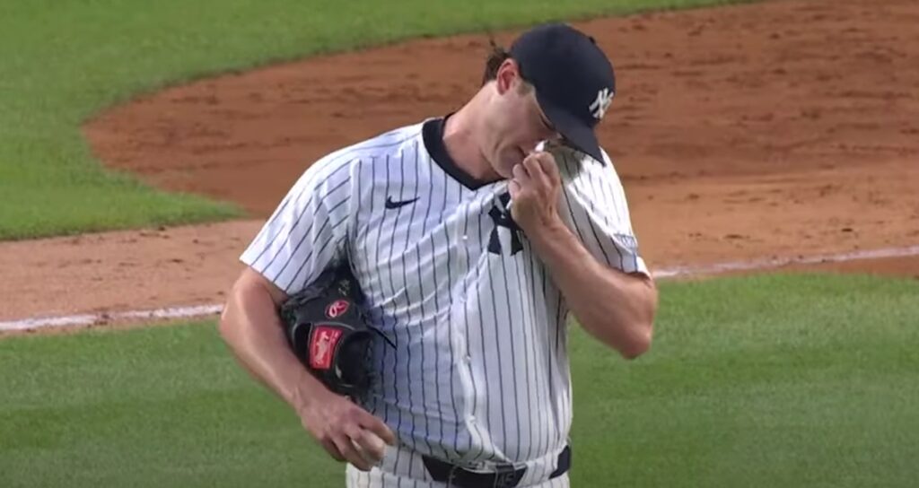 Gerrit Cole wipes his face