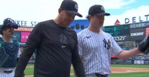 Cole walks into the dugout