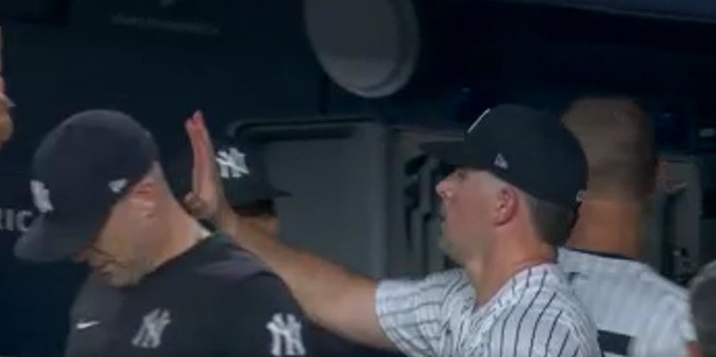 Rodon celebrates in the clubhouse