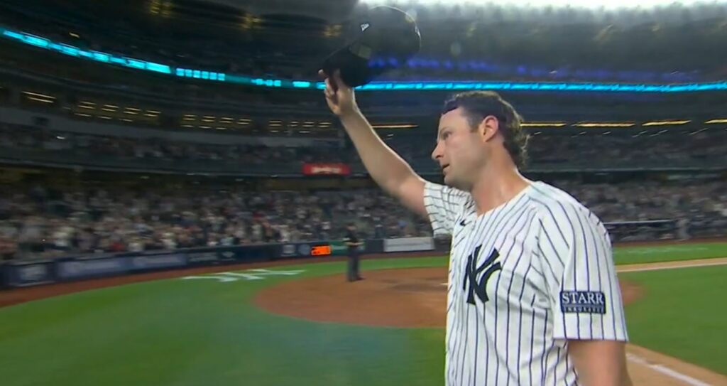 Cole waves his cap