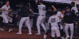 The Yankees celebrate Aaron Judge's go-ahead grand slam