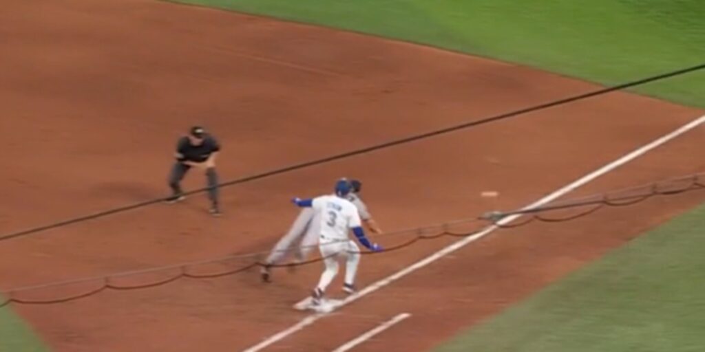 Peraza throws the ball away