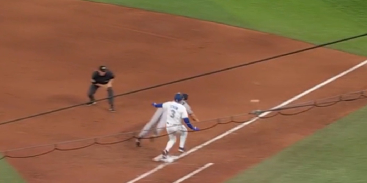 Peraza throws the ball away