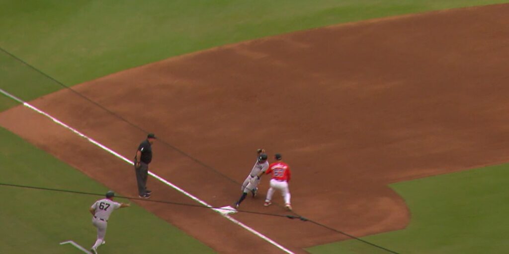 Vivas is thrown out at third