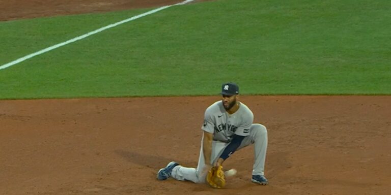 The ball goes through Rosario's legs