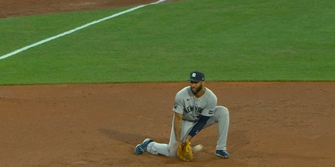 The ball goes through Rosario's legs