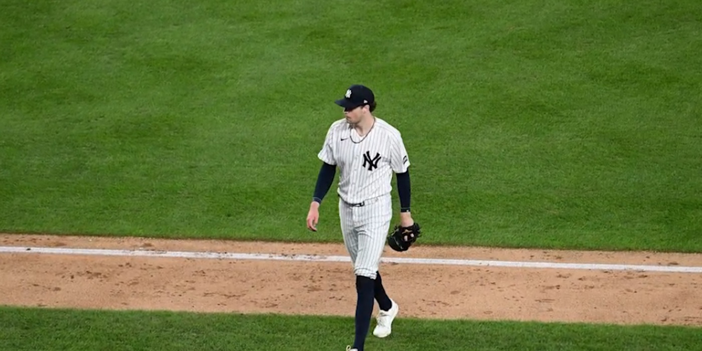 Cam Schlittler walks off of the field